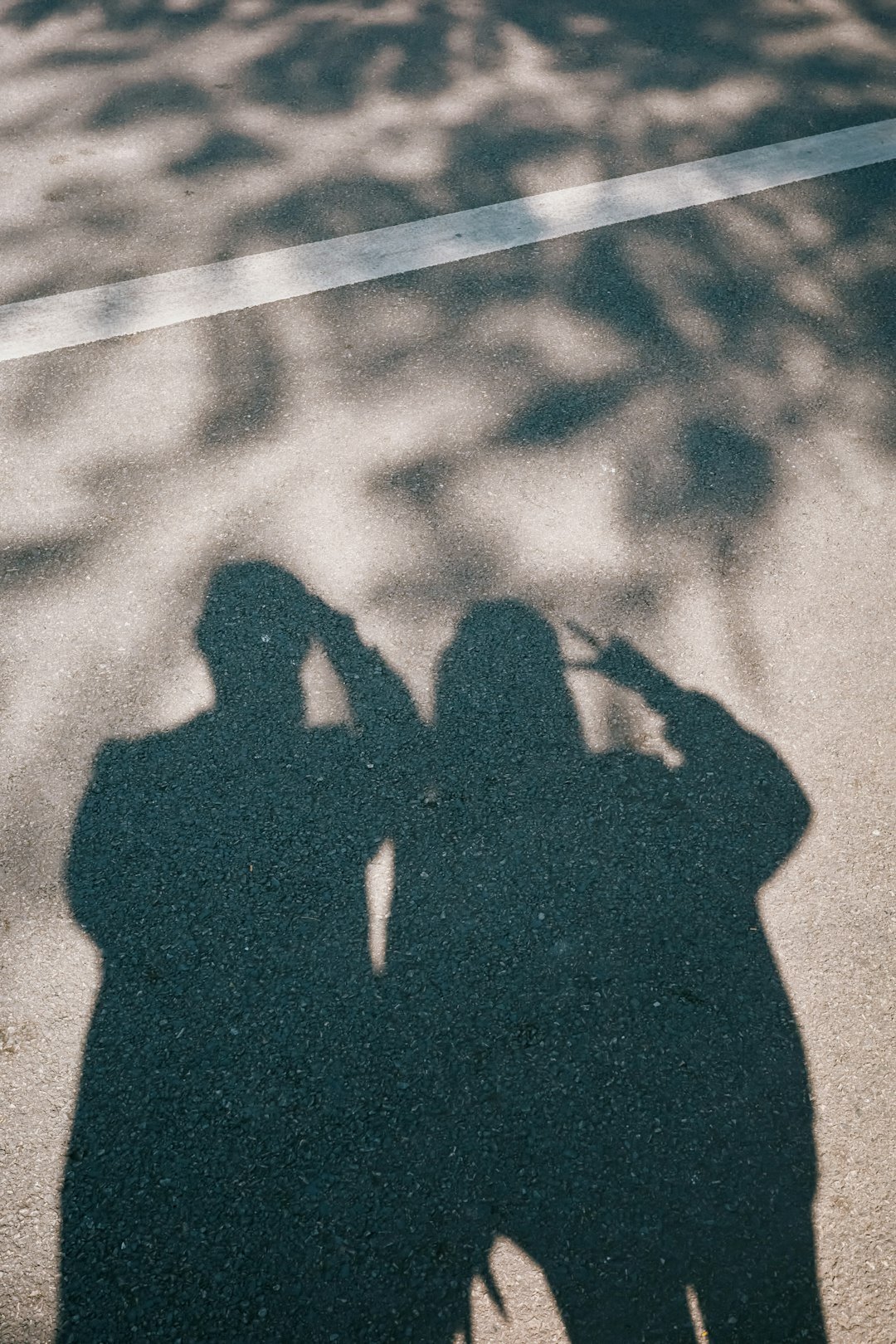 couple embracing in shadows